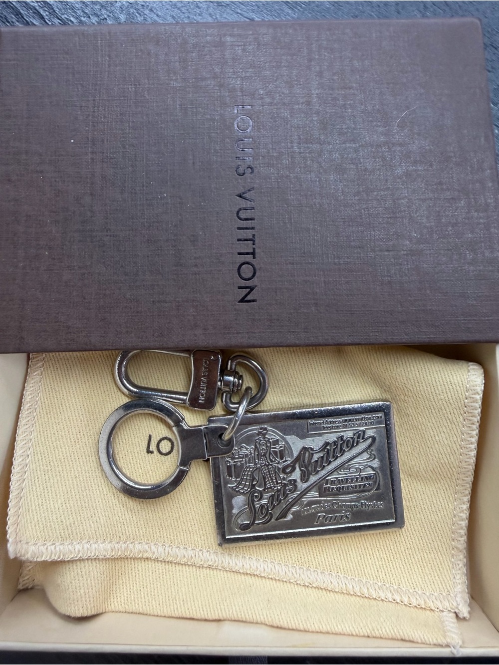 Louis Vuitton Silver-Tone Engraved Metal Key Chain/Bag Charm
